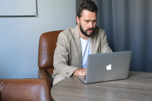 outsourced professional worker on laptop